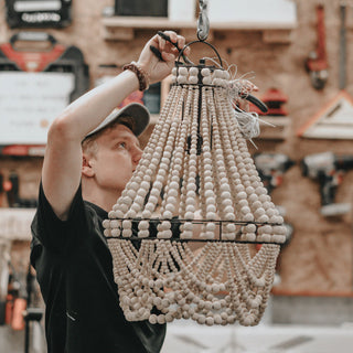 Beads brought back from a honeymoon in Bali, are now a custom chandelier.