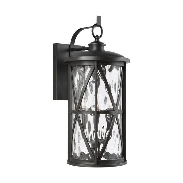 Generation Lighting - OL15203ANBZ - Three Light Outdoor Wall Lantern - Millbrooke - Antique Bronze from Lighting & Bulbs Unlimited in Charlotte, NC