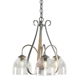 Buy vintage-platinum-with-water-glass-ll-glass-and-clear-textured-shade Sweeping Taper Chandelier by Hubbardton Forge