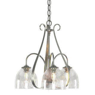 Buy sterling-with-water-glass-ll-glass-and-clear-textured-shade Sweeping Taper Chandelier by Hubbardton Forge