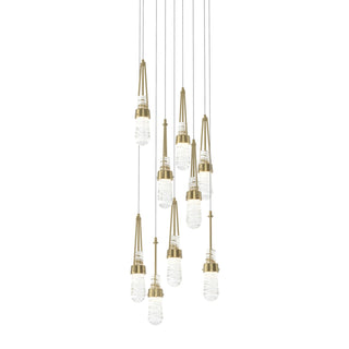 Buy modern-brass-with-clear-glass-with-white-threading-yj-glass-and-clear-textured-shade Link Pendant by Hubbardton Forge