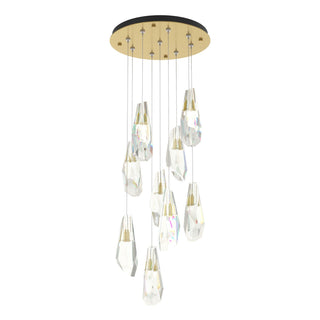 Buy modern-brass-and-clear-textured-shade Luma Pendant by Hubbardton Forge