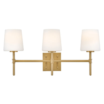 Saunders Vanity by Hinkley – Lights: 3 Light (6.25"L x 23.00"W x 10.75"H) – Finish: Lacquered Brass with Etched Opal Glass and White Shade – Hinkley-56953LCB
