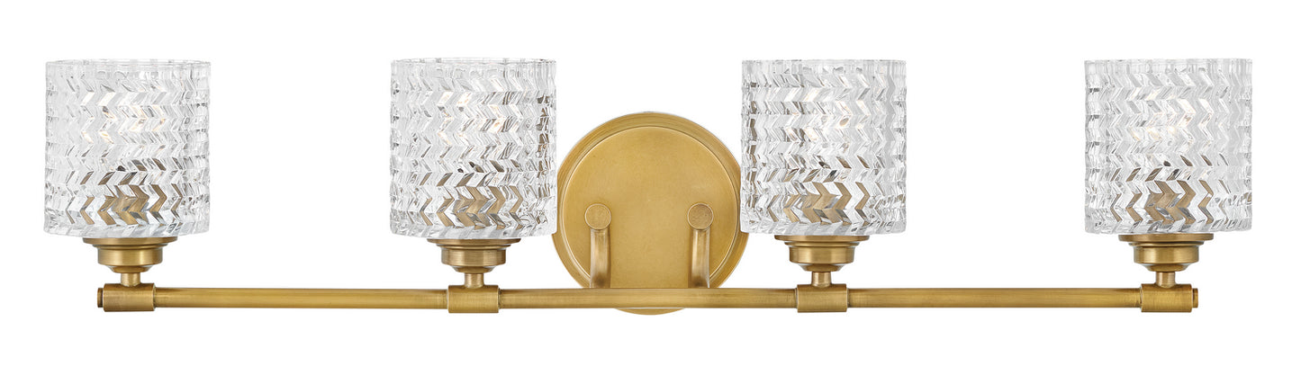 Elle Vanity by Hinkley – Lights: 4 Light (6.50"L x 32.00"W x 7.50"H) – Finish: Heritage Brass with Clear Chevron Glass – Hinkley-5044HB