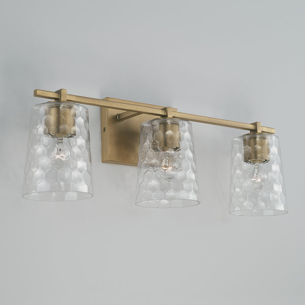 Three Light Vanity from the Burke Collection in Aged Brass Finish by Capital Lighting