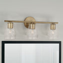 Three Light Vanity from the Dena Collection in Aged Brass Finish by Capital Lighting