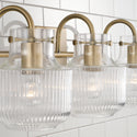 Three Light Vanity from the Nyla Collection in Aged Brass Finish by Capital Lighting