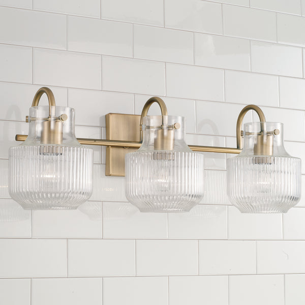 Three Light Vanity from the Nyla Collection in Aged Brass Finish by Capital Lighting