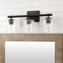 Three Light Vanity from the Ogden Collection in Brushed Black Iron Finish by Capital Lighting