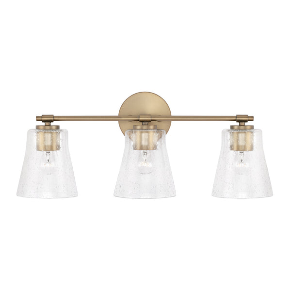 Three Light Vanity from the Baker Collection in Aged Brass Finish by Capital Lighting