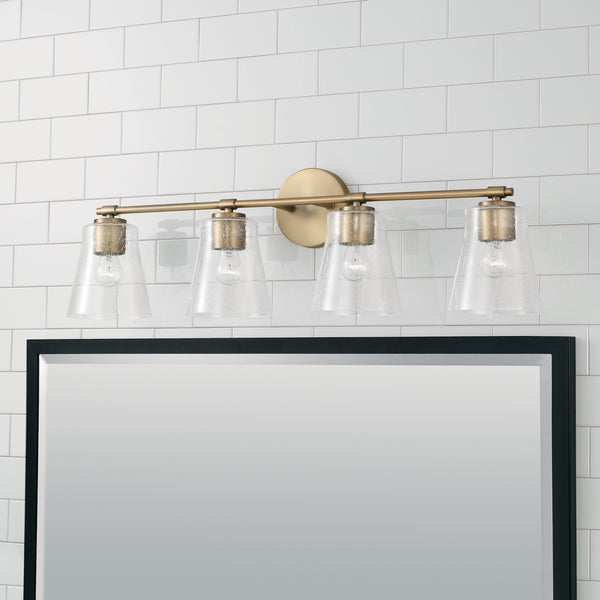 Four Light Vanity from the Baker Collection in Aged Brass Finish by Capital Lighting